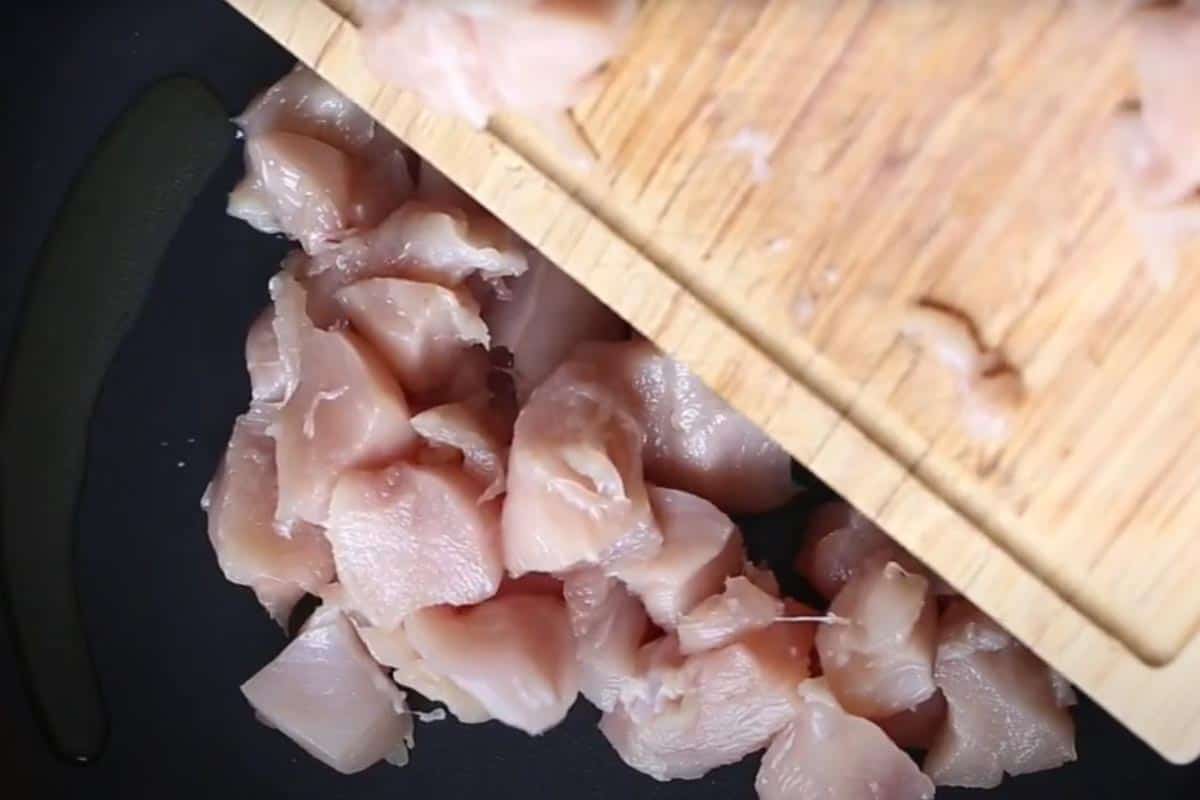 Added the chicken to the skillet.