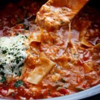A lighter and healthier version of lasagna with all of the traditional flavours, this easy to make low fat lasagna soup comes together in minutes! No layering. No waiting around your oven. Simply throw all of your ingredients into your slow-cooker or crockpot and you have lasagna soup ready to be served whenever you are; with minimal work and maximum taste! | https://cafedelites.com