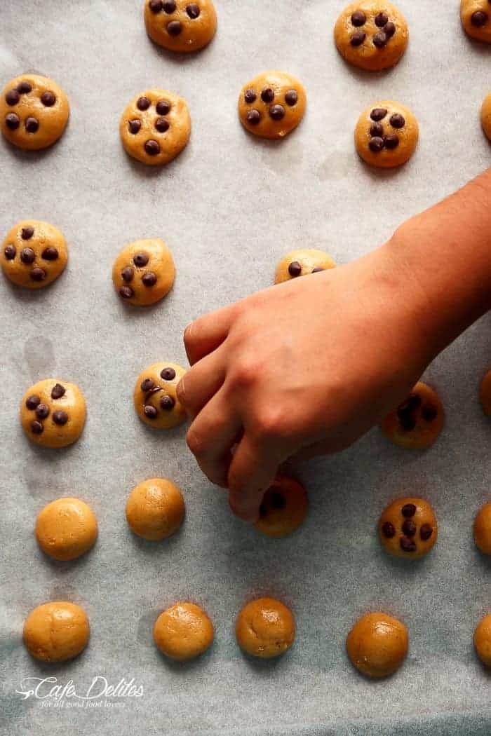 Round dough for Mini Chocolate Chip Greek Yogurt Cookies on a baking tray