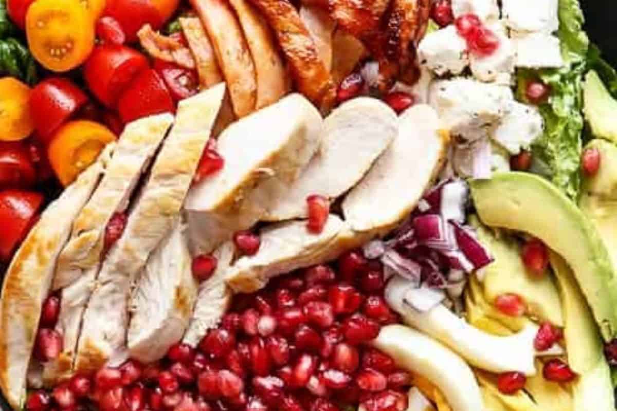 Arrange all the salad ingredients in a large serving bowl