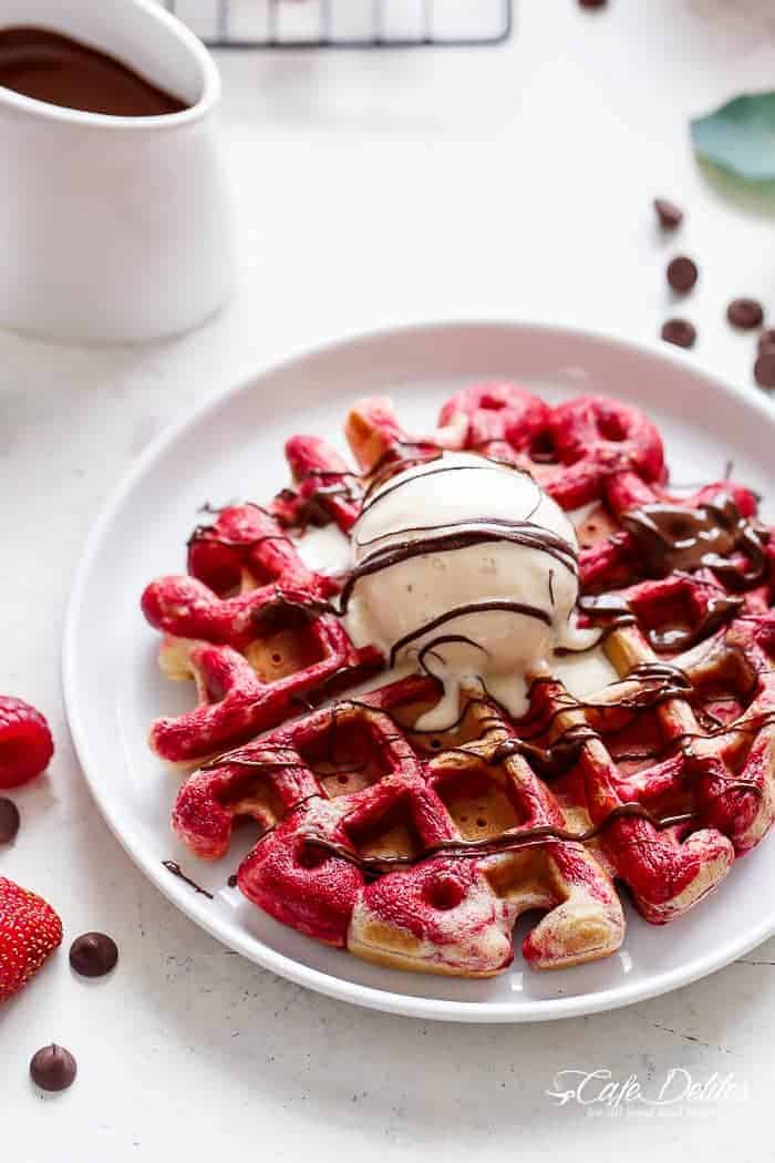 Red Velvet Marbled Waffles or Valentine's Day Waffles made healthier with Greek Yogurt are absolutely incredible! Drizzled in melted chocolate and top with ice cream for extra indulgence! | http://cafedelites.com