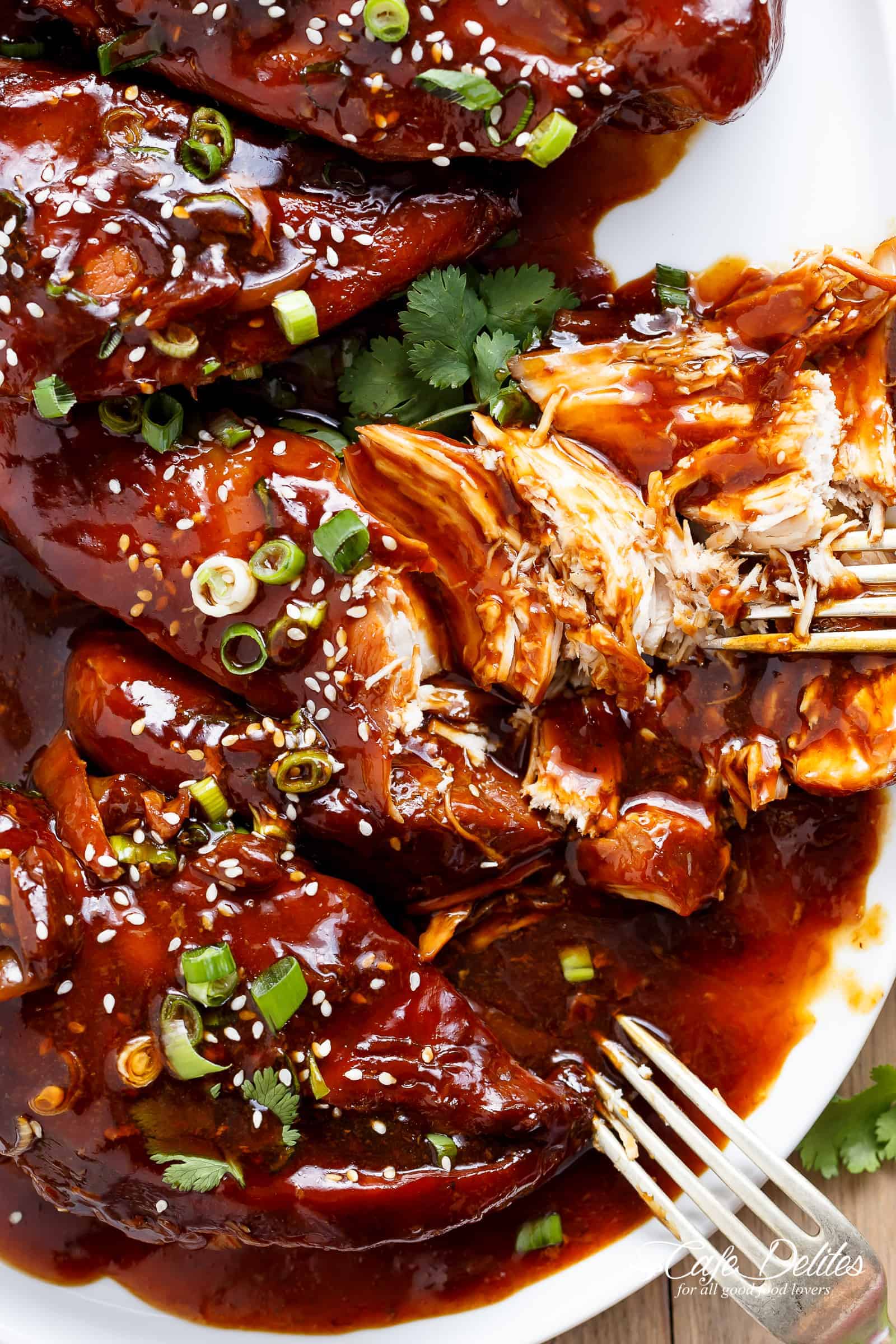 Slow Cooker Asian Glazed Chicken Breasts (or chicken thighs) with honey garlic aromas, perfectly slow cooked and waiting for you when you get home. | cafedelites.com