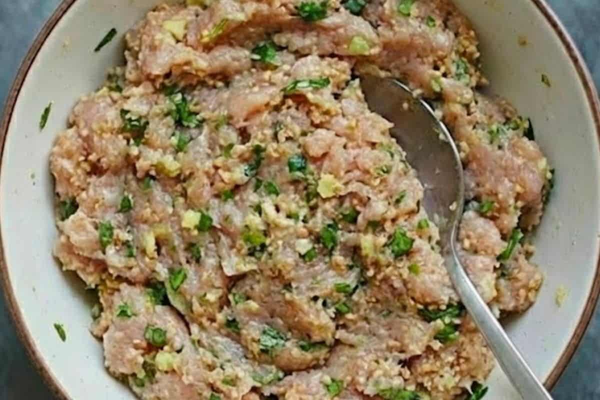 Add all meatball ingredients to a large bowl and mix until evenly combined - 3