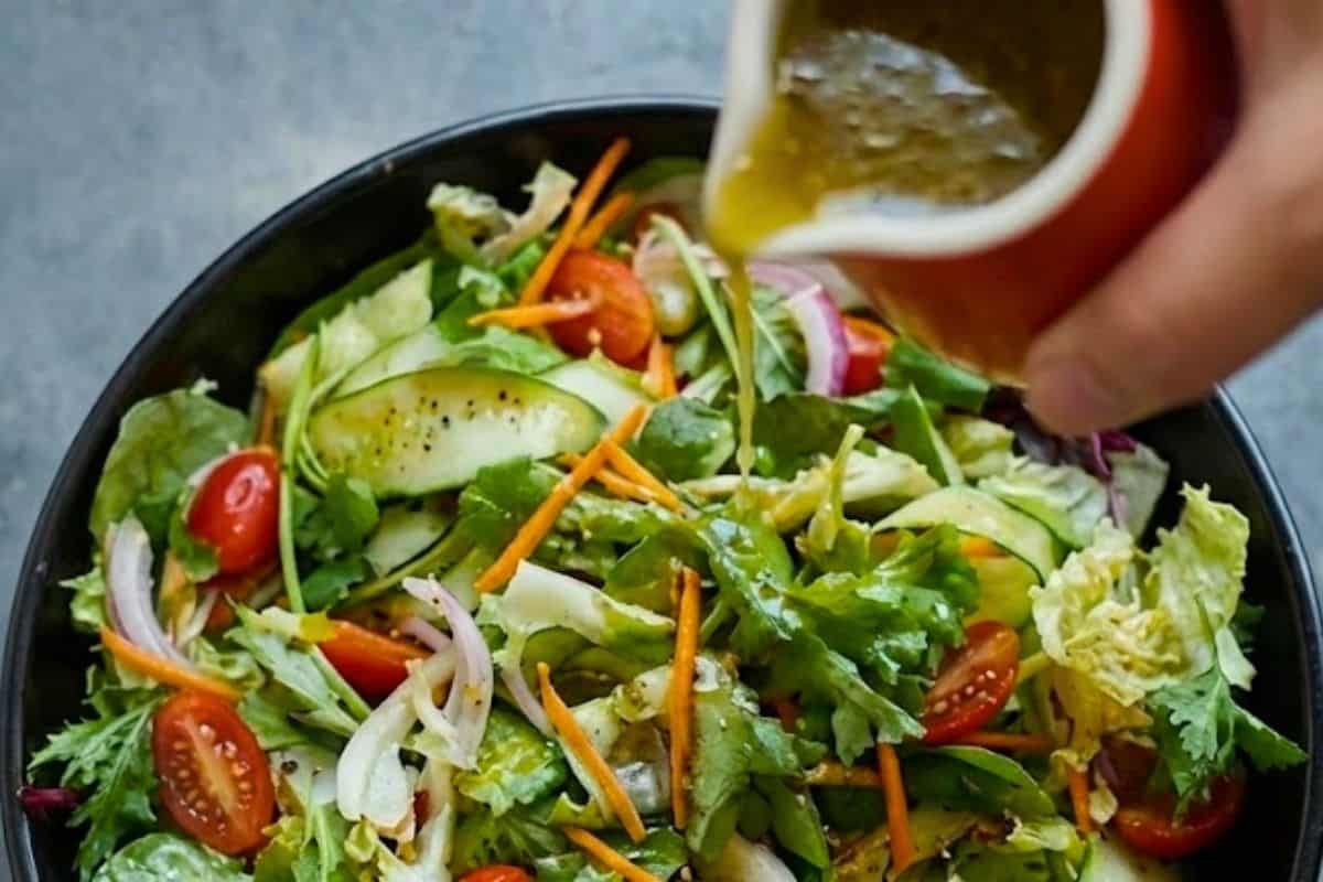 Combine all salad ingredients in a large bowl, then whisk dressing ingredients in a jug until well mixed and pour over the leaves - 7