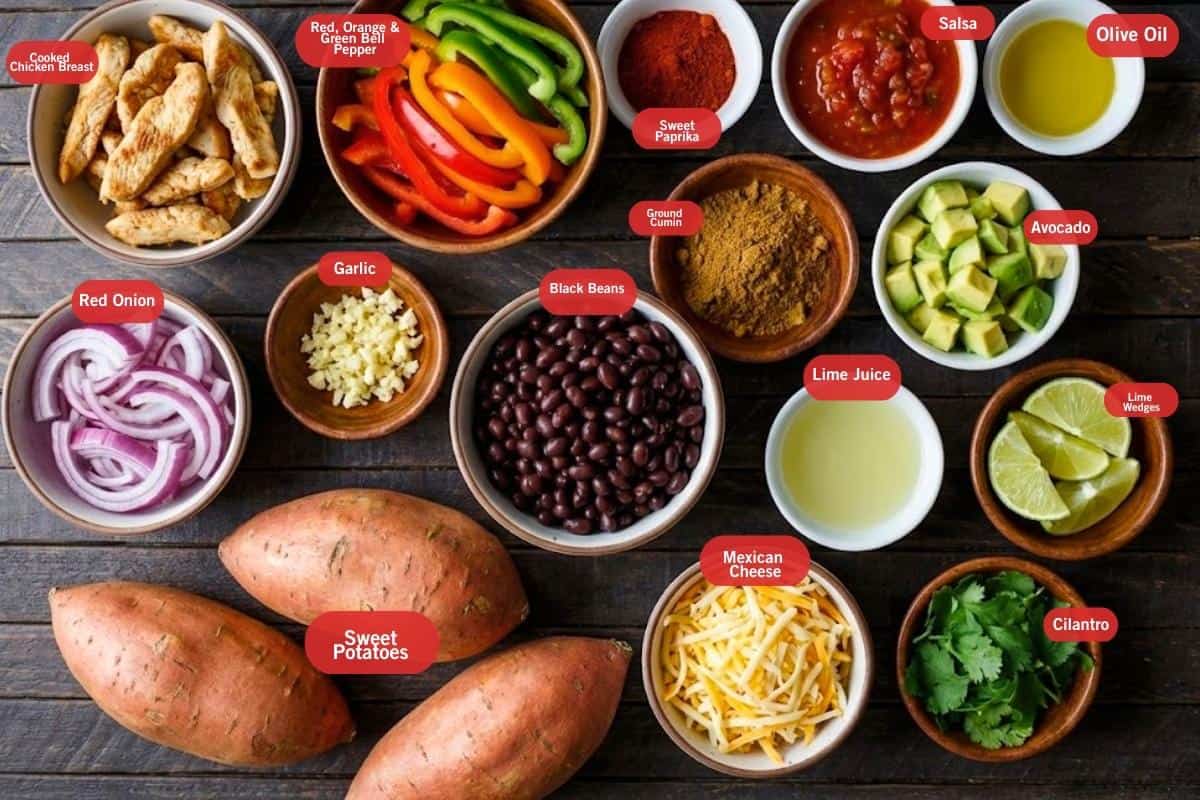 Flat lay photo of ingredient shot of 
twice baked sweet potatoes fajitas
(cooked chicken breast, red, green, orange bell pepper, salsa, black beans, olive oil, avocado, lime wedges, cilantro, Mexican cheese, sweet potatoes, red onion, garlic, ground cumin, sweet paprika) - 2