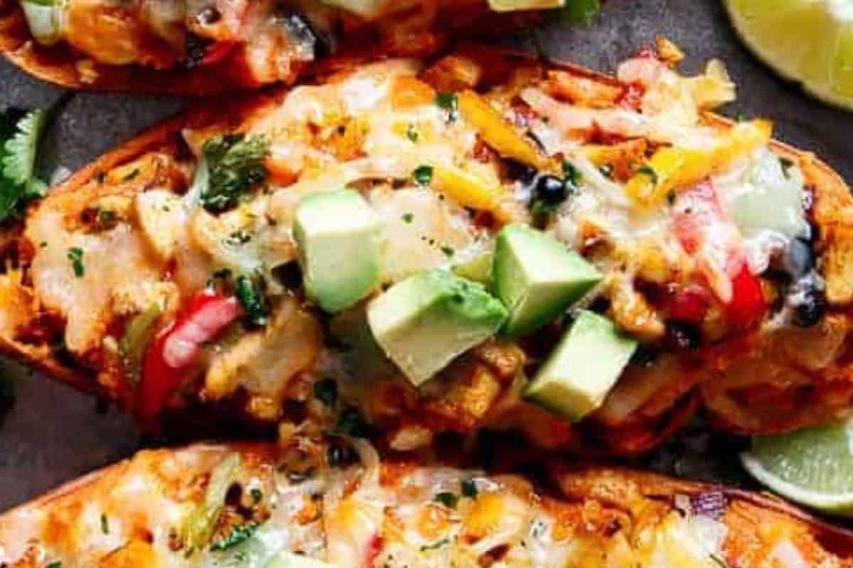 Place the potato skins back on the baking tray and fill them with the mixture. Sprinkle with shredded cheese and cilantro - 9