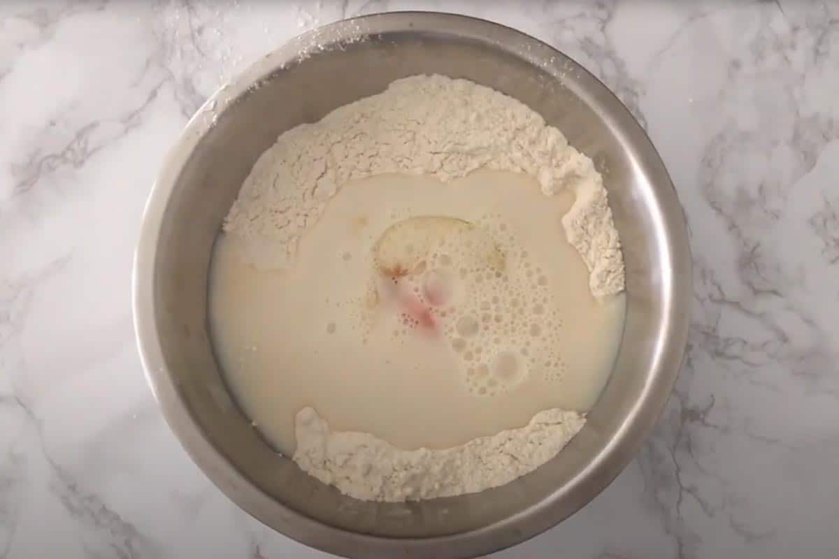 Added the egg, vanilla, and milk in the bowl.