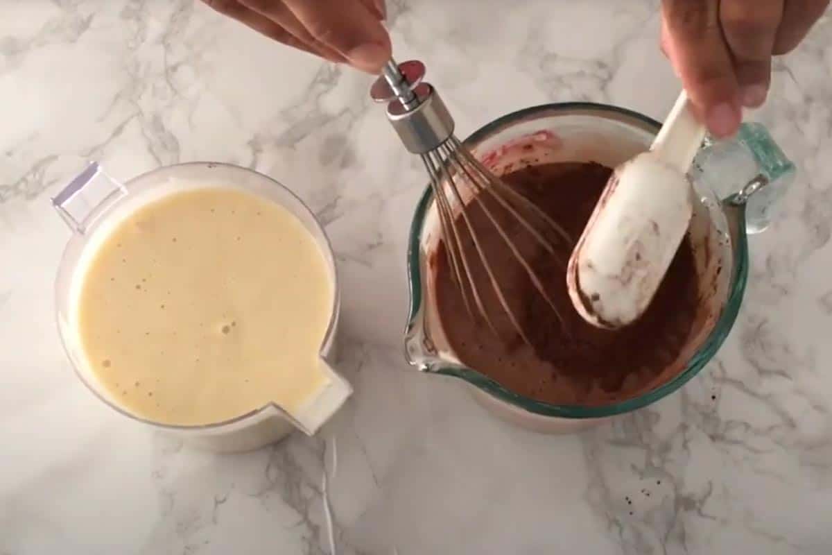 Adjusting the chocolate batter.