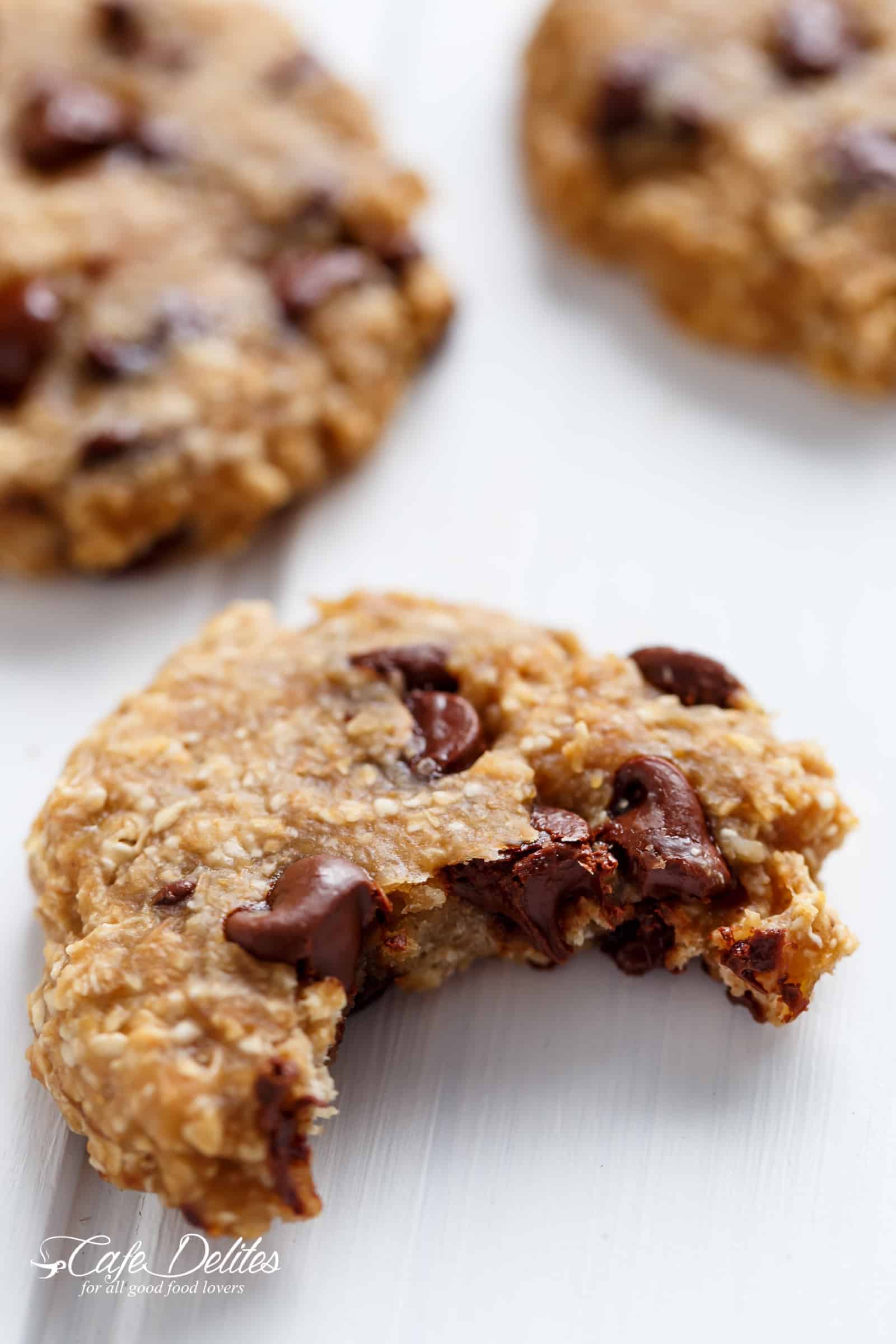 Close-up of a breakfast cookie with a bite missing. 