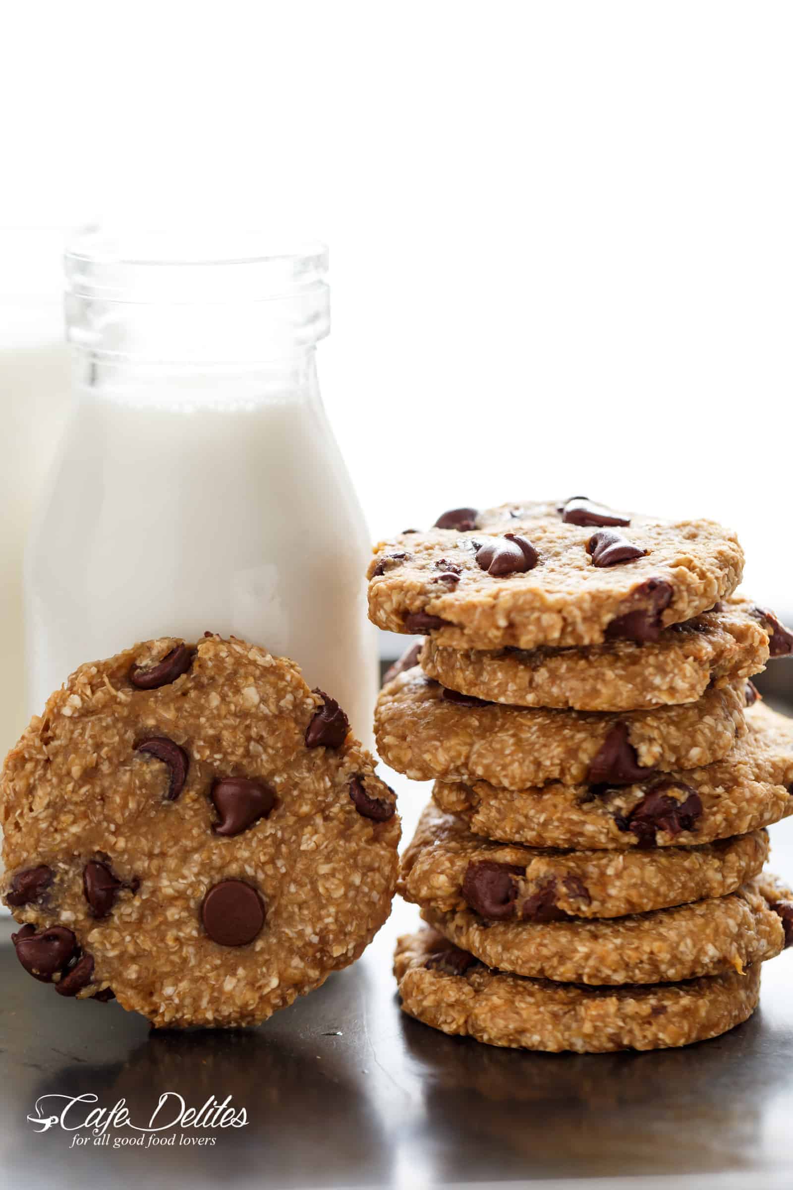 A stack of 2-Ingredient Healthy Breakfast Cookies next to a small bottle of milk.