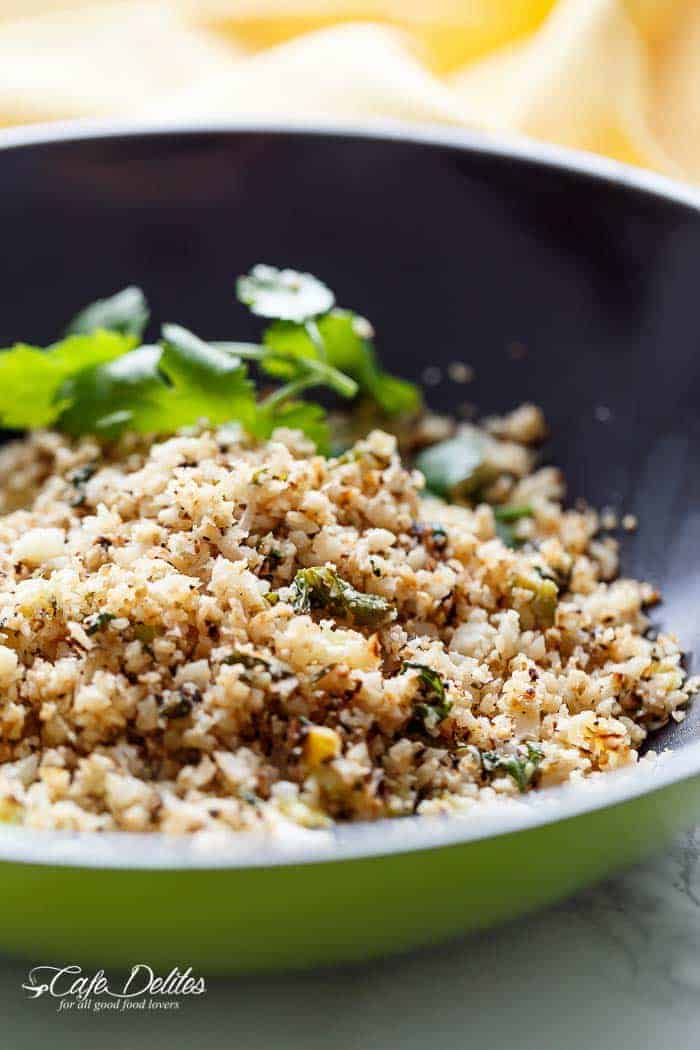 Cilantro Lime Cauliflower Rice comes to the rescue when you're craving a carb loaded meal, without the extra calories! | https://cafedelites.com