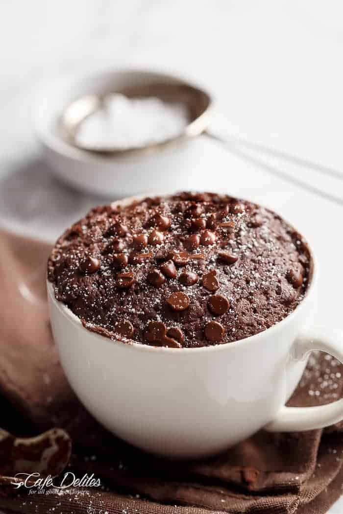 Low Fat Chocolate Mug Cake recipe WITH another video. Ready in less than one minute! Fluffy. Buttery and soft. The BEST low fat, guilt-free mug cake! | https://cafedelites.com