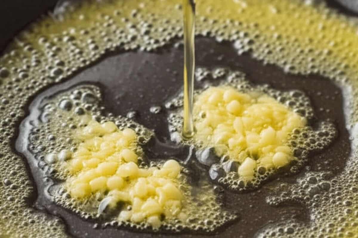 pour in the white wine and bring it to a boil