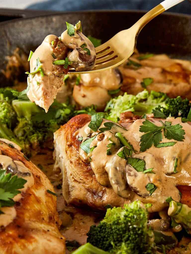 creamy chicken mushroom recipe on a gold fork