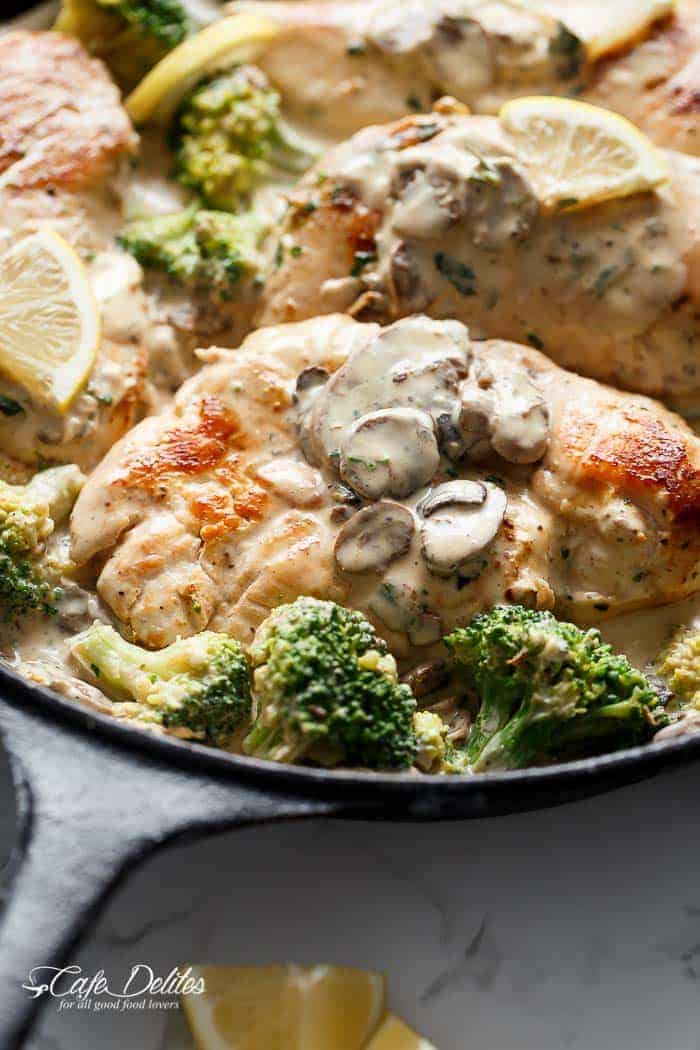 Lightened up to indulge in more! Julia Child's Creamy Chicken + Mushroom (also known as Supremes De Volaille Aux Champignons), gets a lower fat make over and is cooked in one skillet! | https://cafedelites.com
