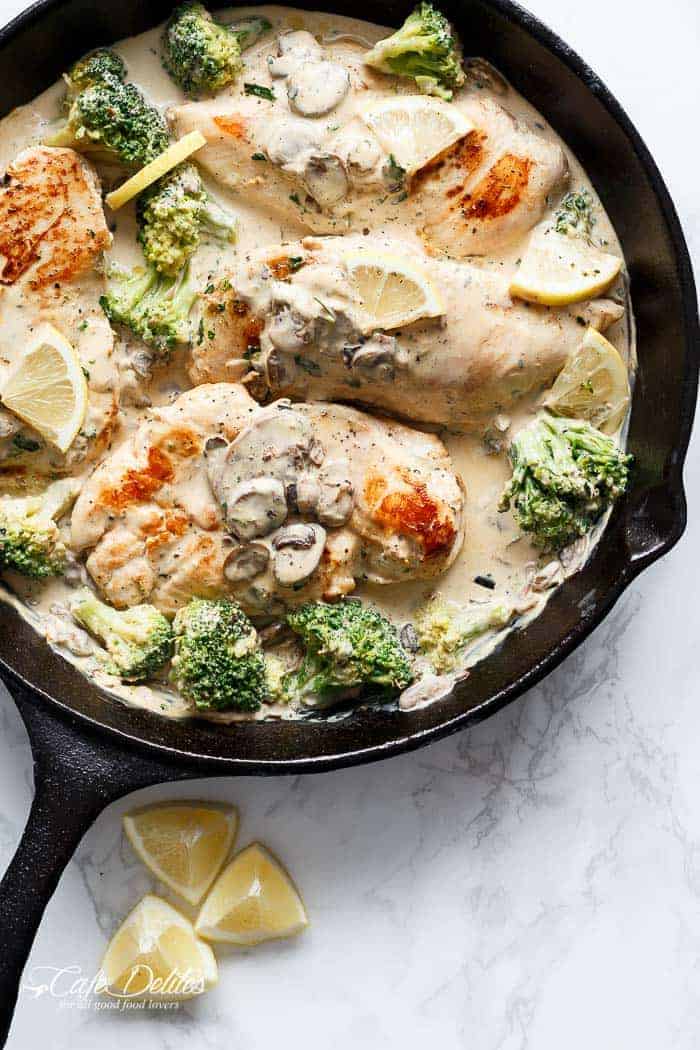 Lightened up to indulge in more! Julia Child's Creamy Chicken + Mushroom (also known as Supremes De Volaille Aux Champignons), gets a lower fat make over and is cooked in one skillet! | http://cafedelites.com
