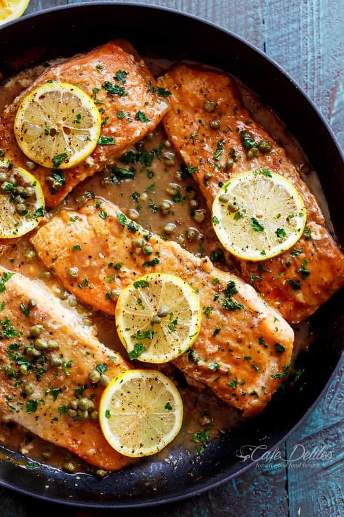 A lightened up, Easy Salmon Piccata with all of the authentic Piccata flavours of white wine, capers, lemon and garlic. Gourmet cooking in minutes! | https://cafedelites.com