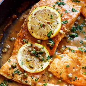 Salmon Piccata topped with lemon slices