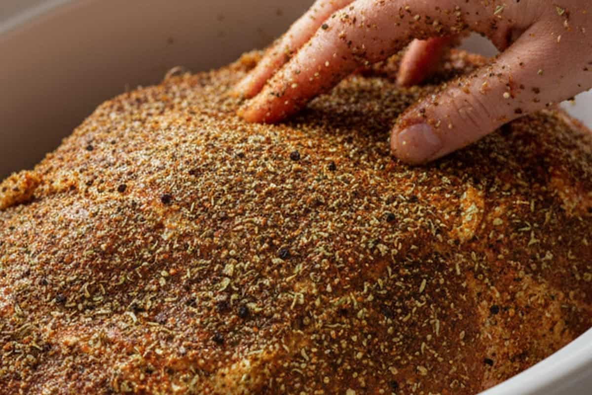 Added oregano, cumin, paprika, salt, pepper, and brown sugar over the pork.