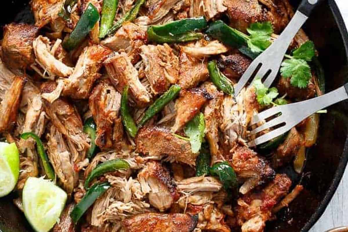 Close-up shot of Slow Cooker Carnitas (Mexican Pulled Pork).