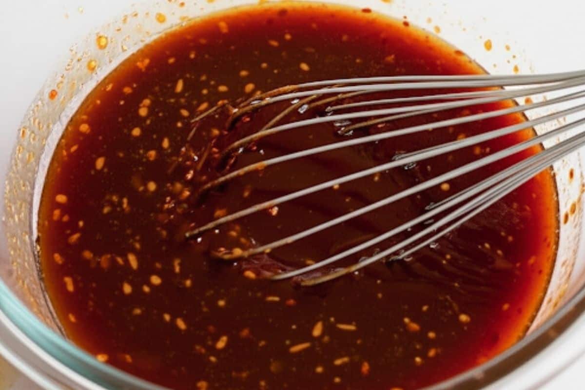 Whisk all the glaze ingredients in a bowl and pour half into a small sauce pan  and reserve for later.