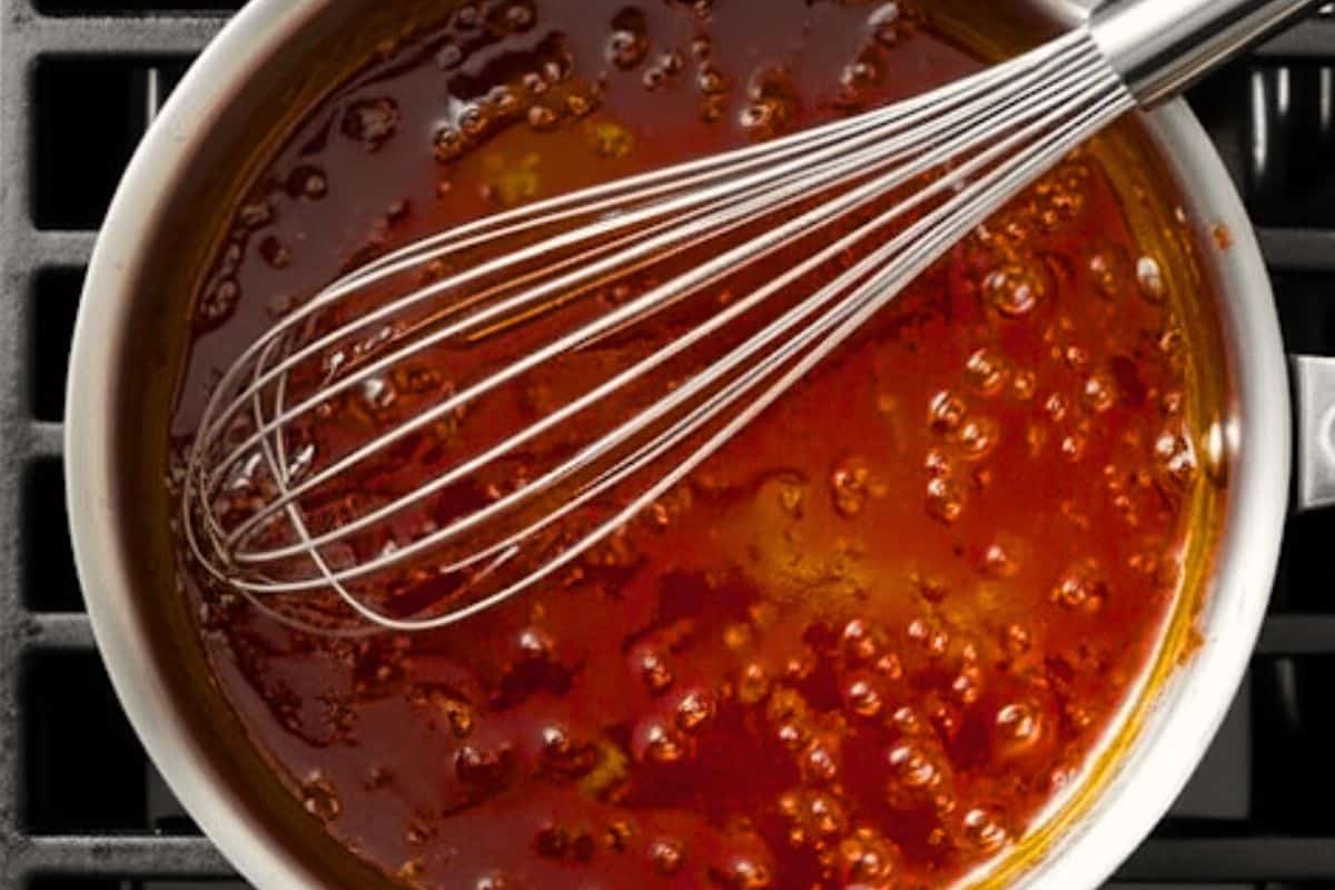 Bring the reserved glaze to a gentle simmer and cook until it bubbles and slightly thickens. 