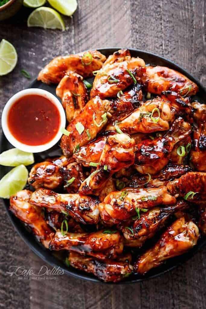 Sticky Thai Chicken Wings glazed with a sticky sauce infused with authentic Thai flavours on a platter