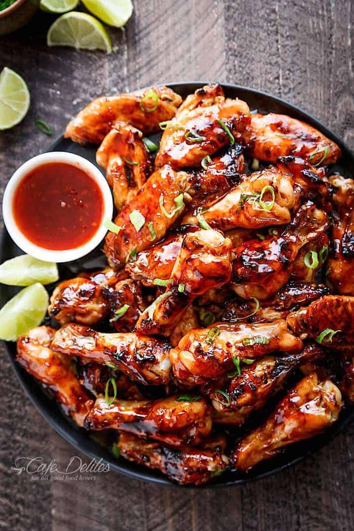 Sticky Thai Chicken Wings glazed with a sticky sauce infused with authentic Thai flavours you most probably already have on hand in the kitchen! | https://cafedelites.com