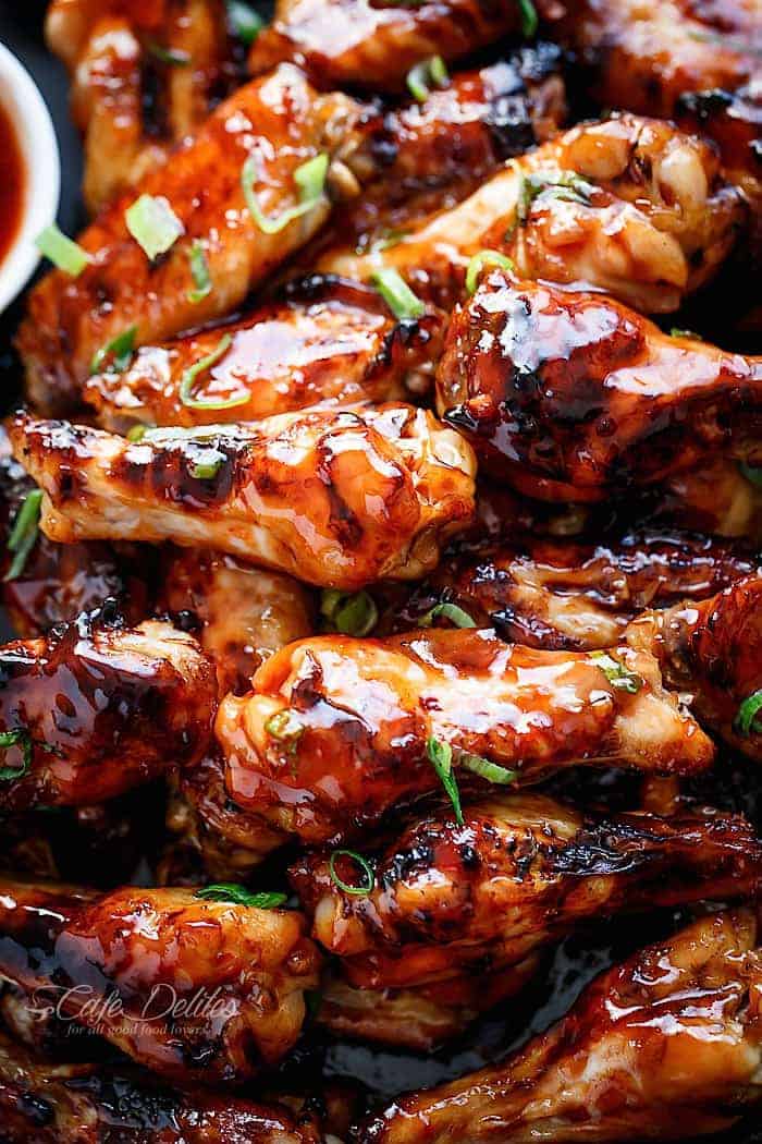 Sticky Thai Chicken Wings glazed with a sticky sauce infused with authentic Thai flavours you most probably already have on hand in the kitchen! | https://cafedelites.com