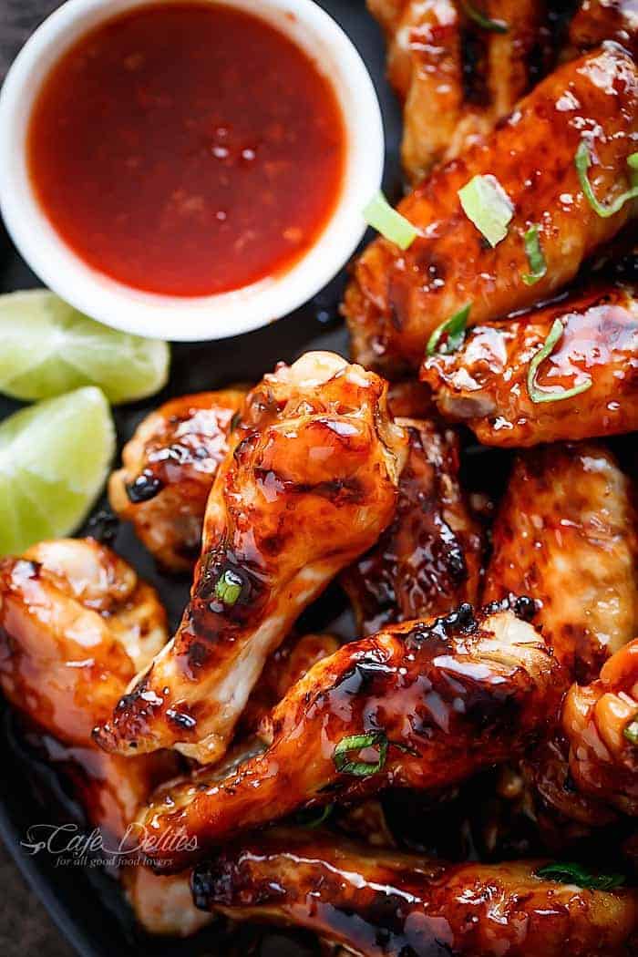 Sticky Thai Chicken Wings glazed with a sticky sauce infused with authentic Thai flavours you most probably already have on hand in the kitchen! | https://cafedelites.com