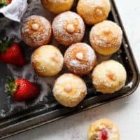 Strawberry Cheesecake Donut Holes on a tray