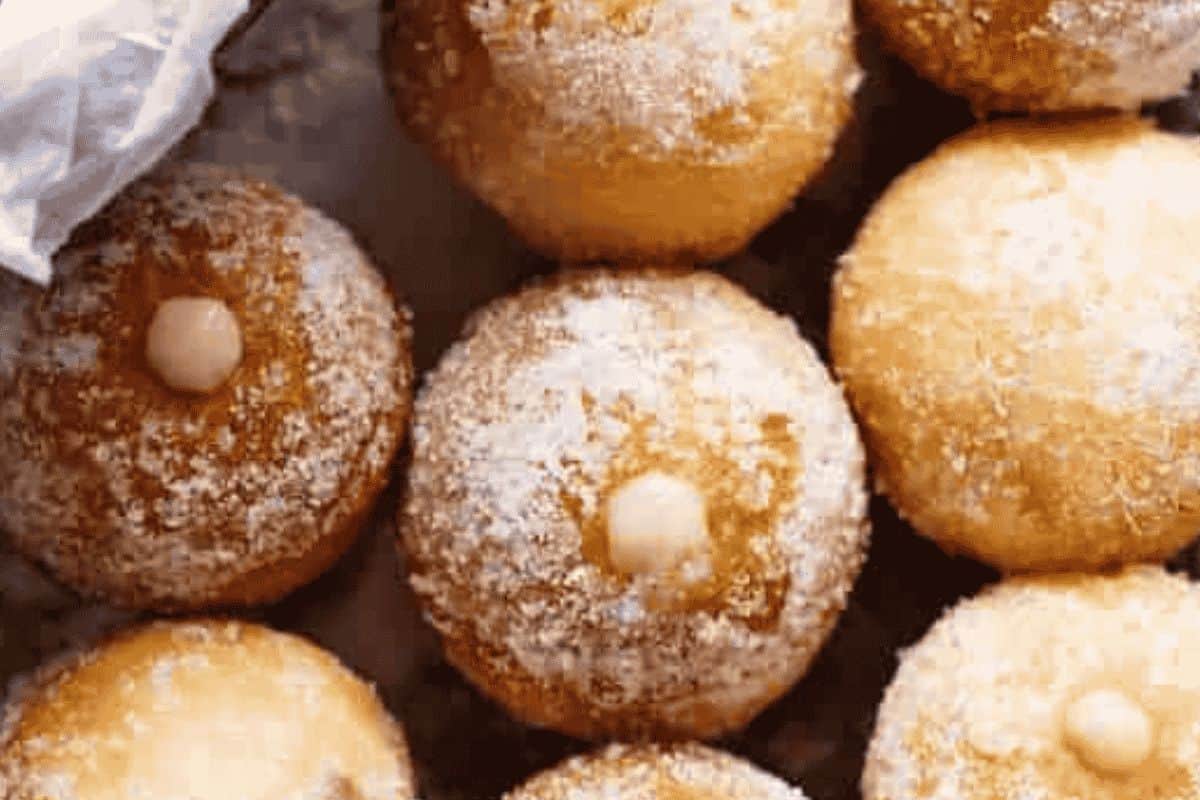 Transfer the filling to a piping bag fitted with a narrow nozzle and pipe into each donut hole until just puffed and filled - 10