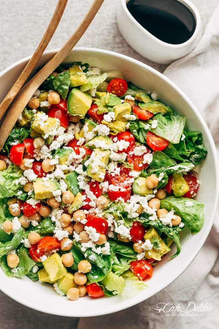 A simple Balsamic Chickpea Avocado Feta Salad full of Summery vibrant colours and flavours. Ready in under 5 minutes as a side or main! | https://cafedelites.com