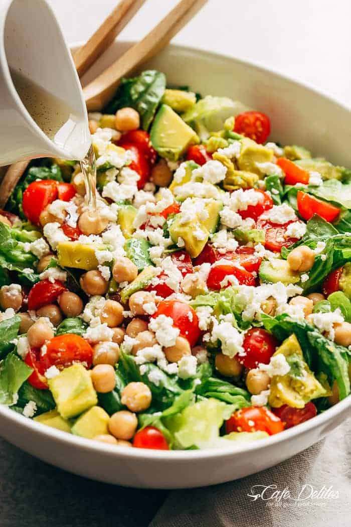 A simple Balsamic Chickpea Avocado Feta Salad full of Summery vibrant colours and flavours. Ready in under 5 minutes as a side or main! | https://cafedelites.com