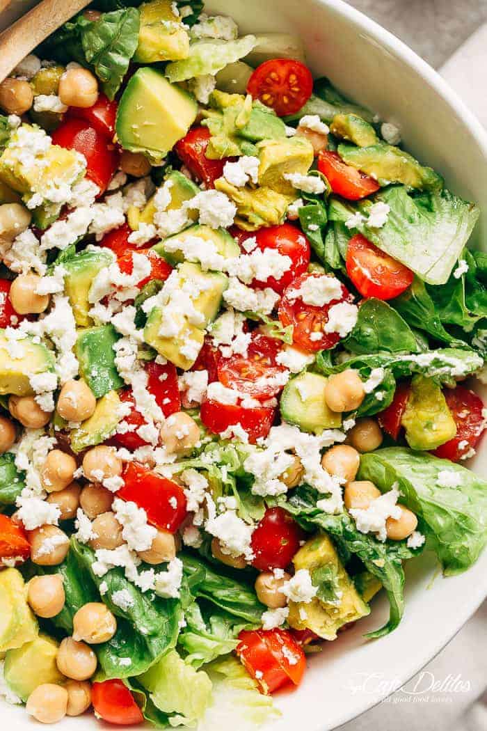 A simple Balsamic Chickpea Avocado Feta Salad full of Summery vibrant colours and flavours. Ready in under 5 minutes as a side or main! | https://cafedelites.com