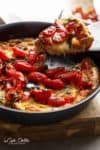Garlic infused, Caprese Frittata with pan fried, juicy tomato and fresh basil flavors. Breakfast, brunch, lunch or dinner! Easy to make and low carb/cal! | https://cafedelites.com