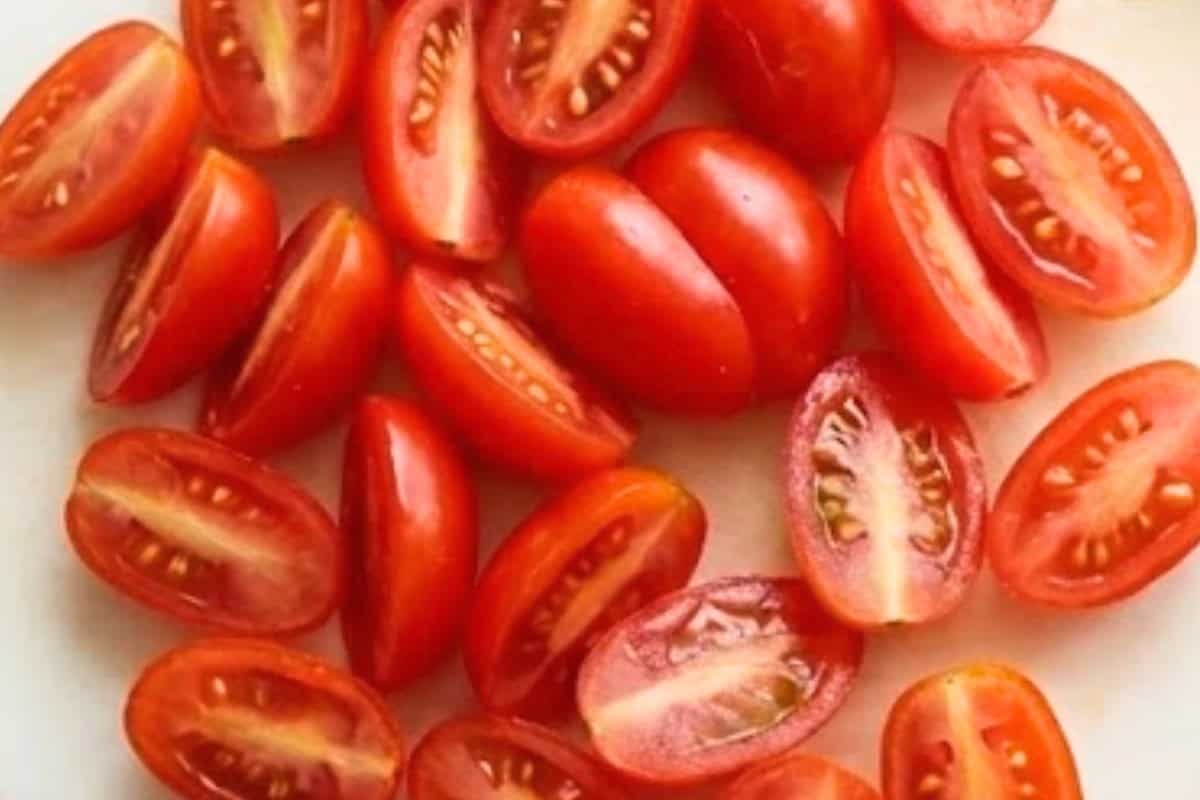 Slice grape tomatoes in half horizontally