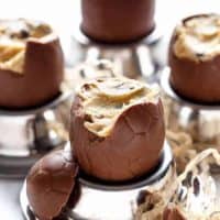 Chocolate Chip Cookie Dough Filled Easter Eggs! Perfect for any event, party OR to use up those Easter eggs in a completely decadent way! | https://cafedelites.com