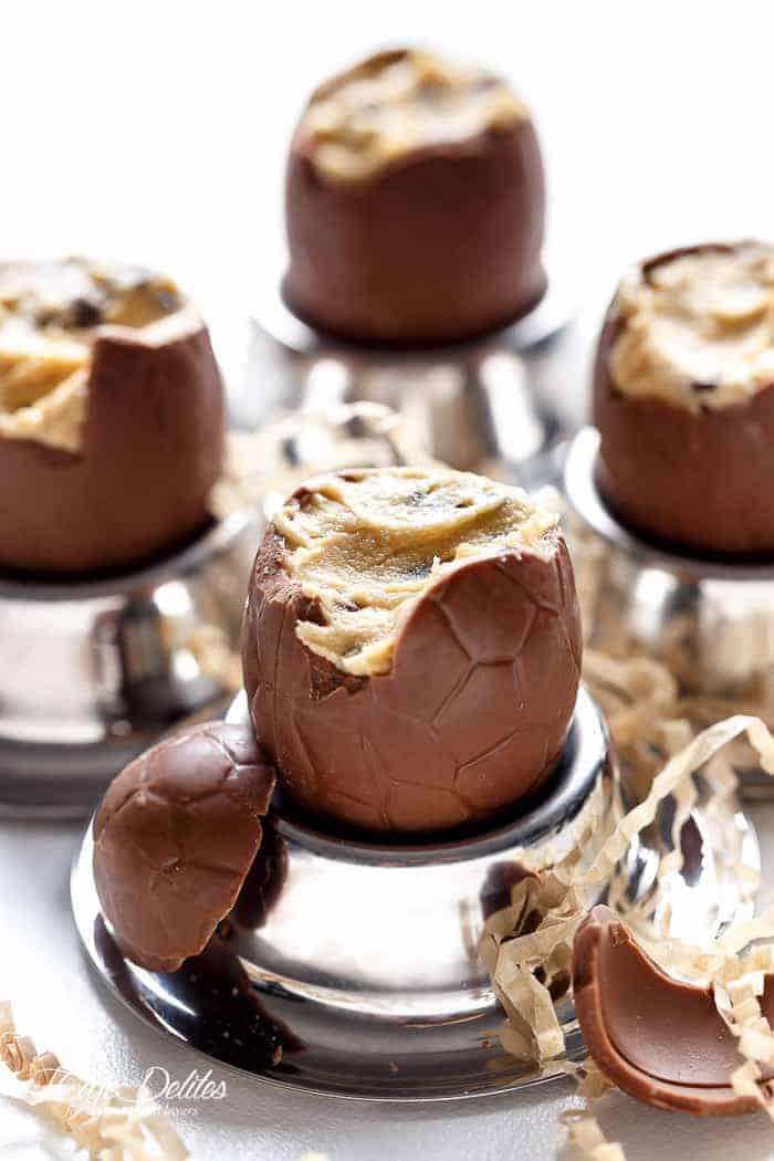 Chocolate Chip Cookie Dough Filled Easter Eggs! Perfect for any event, party OR to use up those Easter eggs in a completely decadent way! | https://cafedelites.com