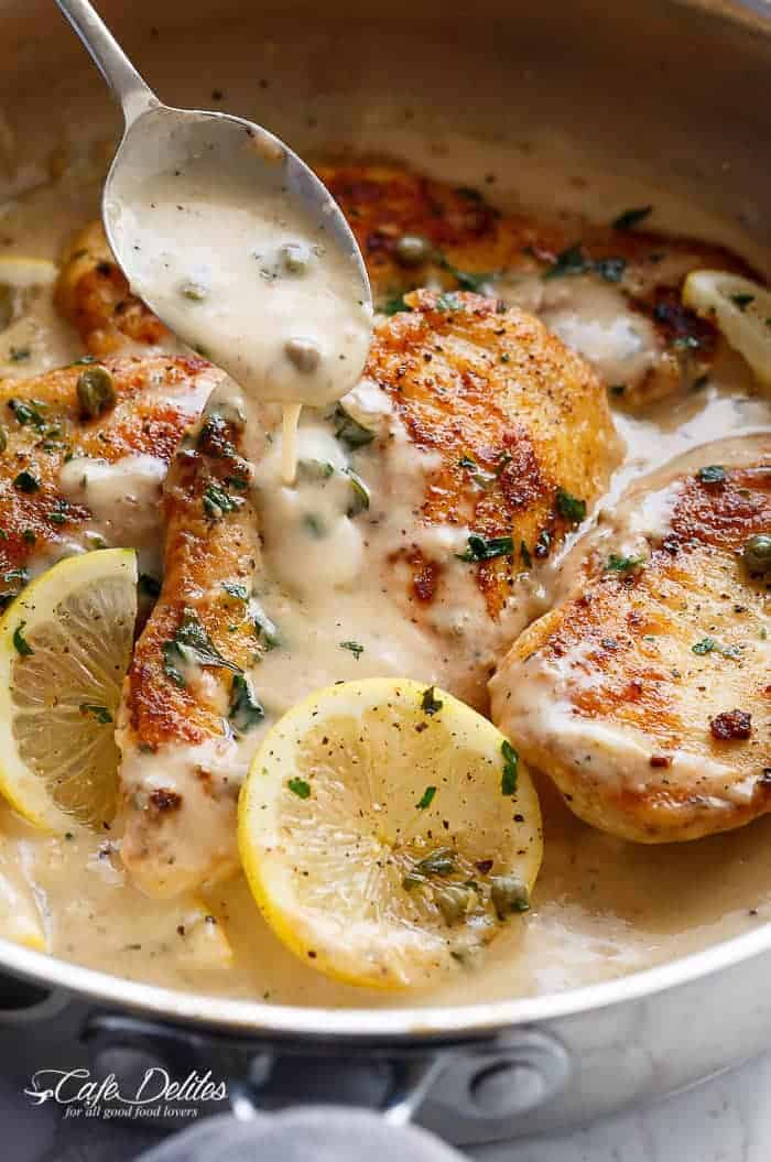 The ultimate in gourmet comfort food with parmesan cheese, garlic and a creamy lemon sauce, this Creamy Lemon Parmesan Chicken Piccata is out of this world. With NO heavy cream! | https://cafedelites.com