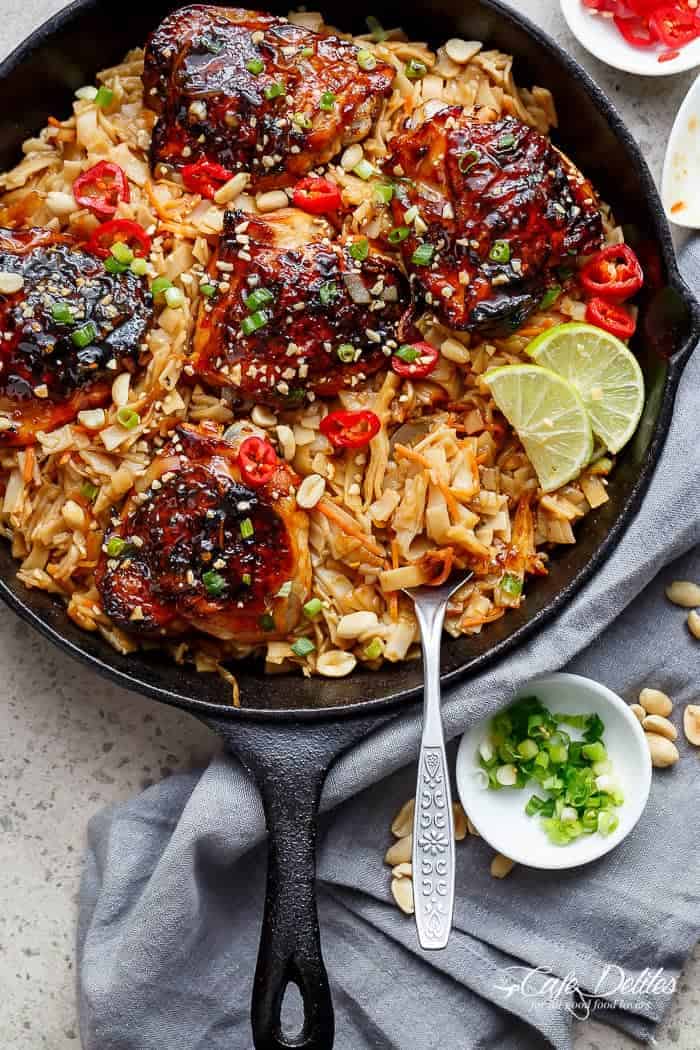 One Skillet Thai Chicken Thighs + Noodles! A sticky, Thai inspired chicken recipe served with Thai Rice noodles, cooked in one skillet! | https://cafedelites.com