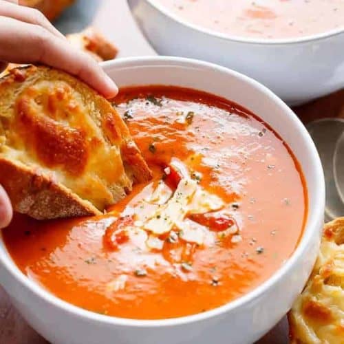 A Creamy Roasted Tomato Basil Soup full of incredible flavours, naturally thickened with no need for cream cheese or heavy creams!