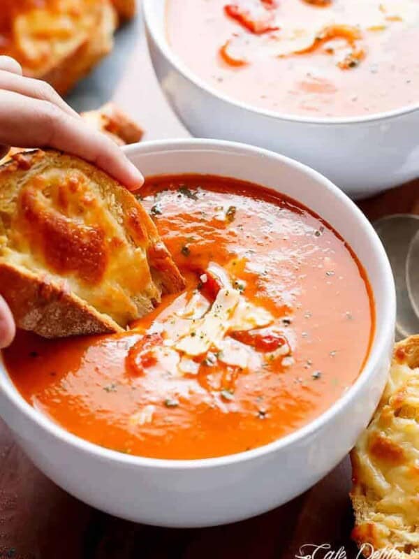 A Creamy Roasted Tomato Basil Soup full of incredible flavours, naturally thickened with no need for cream cheese or heavy creams!