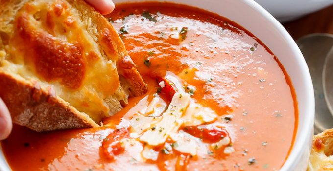 A Creamy Roasted Tomato Basil Soup full of incredible flavours, naturally thickened with no need for cream cheese or heavy creams! | https://cafedelites.com