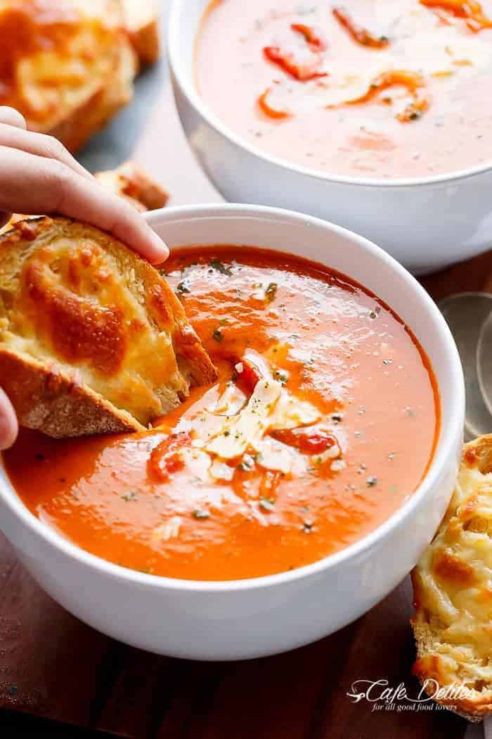A Creamy Roasted Tomato Basil Soup full of incredible flavours, naturally thickened with no need for cream cheese or heavy creams! | https://cafedelites.com