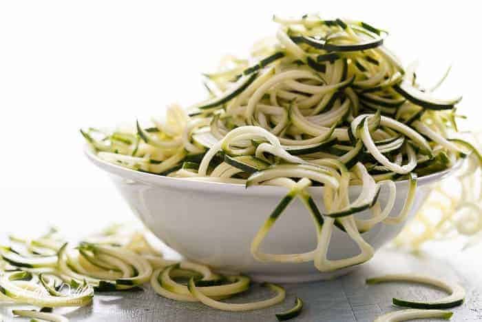 A twist on the classic Singapore Noodles -- same classic flavours only low carb and low calories with Singapore Zoodles! | https://cafedelites.com