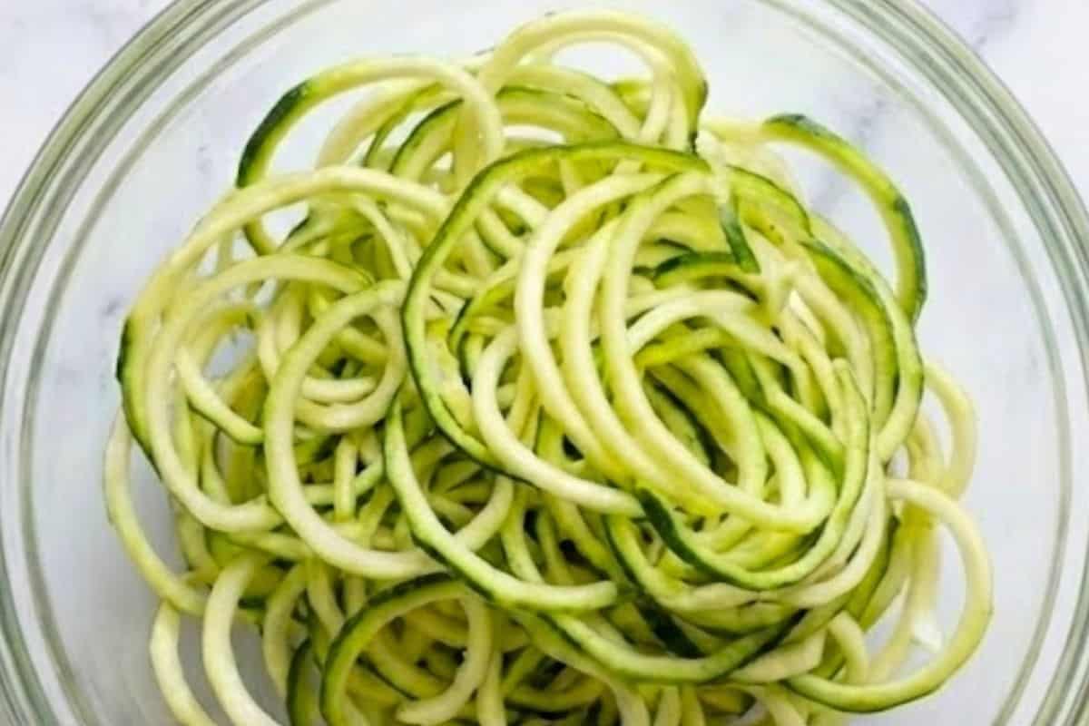 Spiralize the zucchini into thin noodles and place them in a bowl - 5