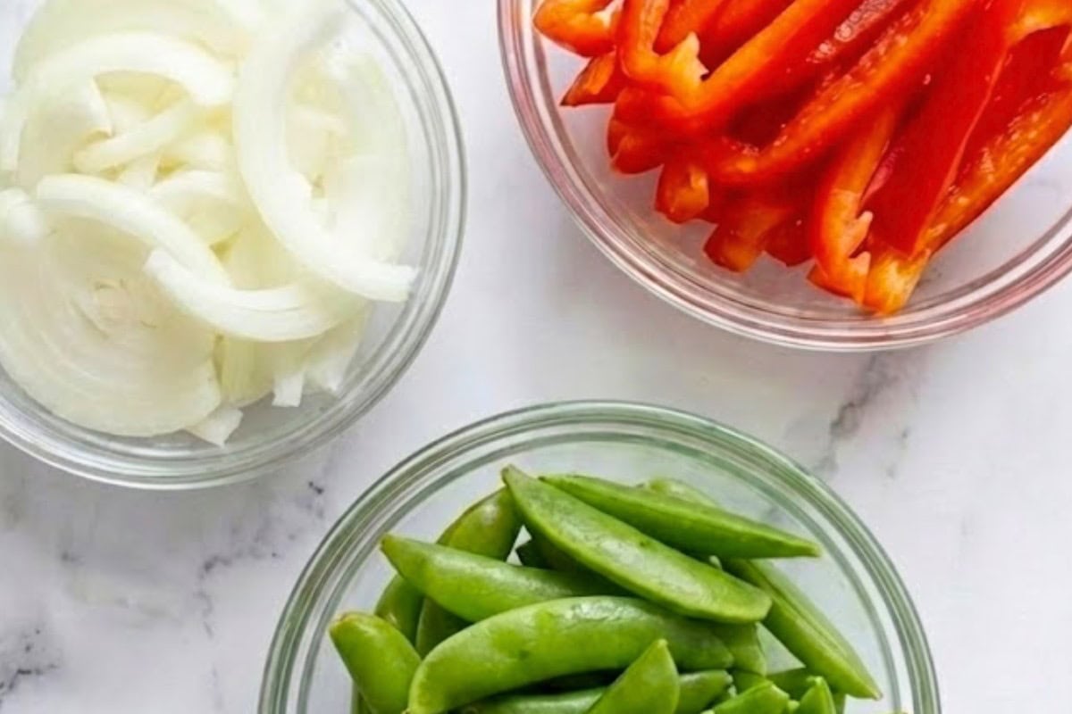 Slice onion, bell pepper and peas. - 6