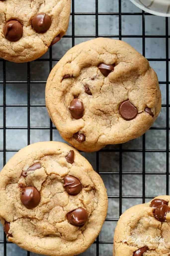 The best, Easy Soft Chewy Chocolate Chip Cookies with simple steps and ONE added ingredient for a soft and chewy experience in LESS THAN 15 minutes! | https://cafedelites.com