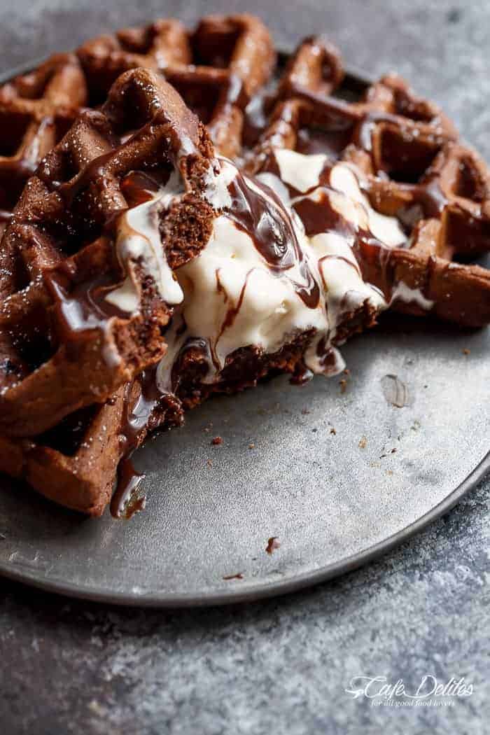 Dark Chocolate Cake Waffles are rich and decadent, chocolate cake transformed into waffles! Perfect for breakfast or dessert with no complicated steps! | https://cafedelites.com